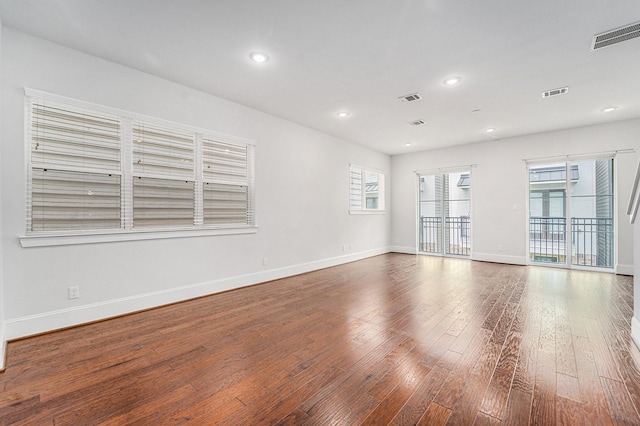1266 N Post Oak Rd Unit B, Houston, TX 77055 - unfurnished room with wood-type flooring and recessed lighting