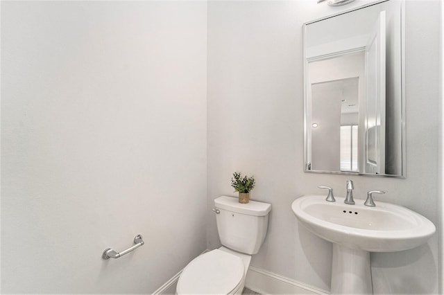 1266 N Post Oak Rd Unit B, Houston, TX 77055 - half bathroom with toilet and baseboards