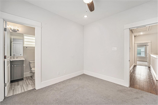 1266 N Post Oak Rd Unit B, Houston, TX 77055 - unfurnished bedroom with carpet floors, attic access, ensuite bathroom, recessed lighting, and ceiling fan