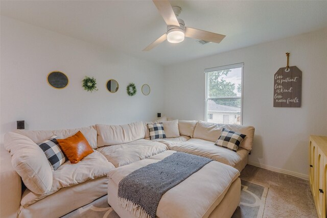 940 Cedar Point Dr, Livingston, TX 77351 - living room featuring carpet, a ceiling fan, and baseboards