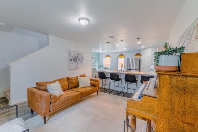 940 Cedar Point Dr, Livingston, TX 77351 - living room with light wood-type flooring and stairway