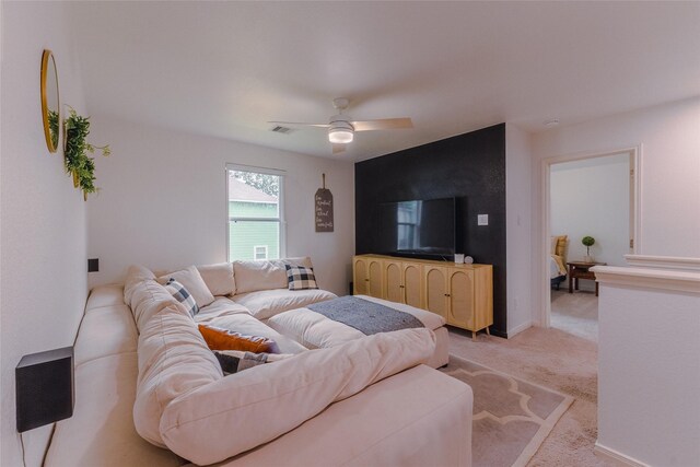 940 Cedar Point Dr, Livingston, TX 77351 - living area with light carpet, ceiling fan, and baseboards