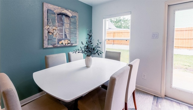 940 Cedar Point Dr, Livingston, TX 77351 - dining room with baseboards and wood finished floors