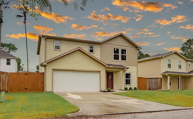 940 Cedar Point Dr, Livingston, TX 77351 - view of front of property with concrete driveway, a garage, and board and batten siding