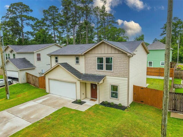940 Cedar Point Dr, Livingston, TX 77351 - view of front of property featuring concrete driveway, board and batten siding, and a shingled roof