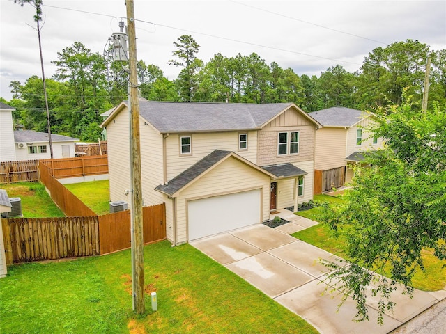 940 Cedar Point Dr, Livingston, TX 77351 - view of front of house featuring driveway, a shingled roof, an attached garage, board and batten siding, and central AC