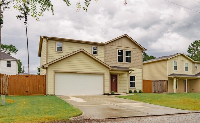 940 Cedar Point Dr, Livingston, TX 77351 - view of front of home with driveway and board and batten siding