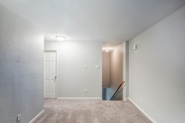 21106 Scenic Bluff Ln, Humble, TX 77338 - spare room with carpet flooring, baseboards, and a textured wall