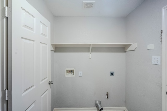 21106 Scenic Bluff Ln, Humble, TX 77338 - washroom with electric dryer hookup, washer hookup, gas dryer hookup, and baseboards