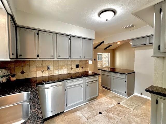 9015 Stone Brook Ln, Houston, TX 77040 - kitchen featuring dishwasher, tasteful backsplash, gray cabinetry, light tile patterned floors, and a sink