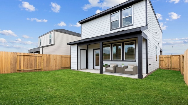 1823 Revolution Way, Missouri City, TX 77489 - rear view of property with a fenced backyard, an outdoor living space, and a patio