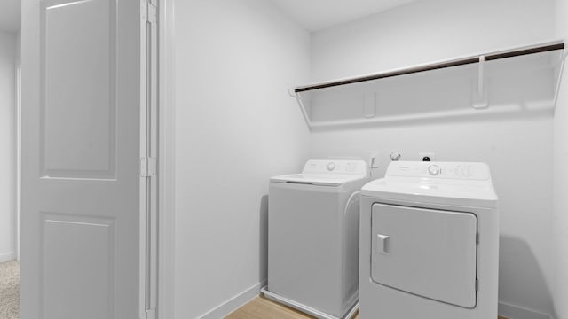1823 Revolution Way, Missouri City, TX 77489 - washroom featuring baseboards and independent washer and dryer