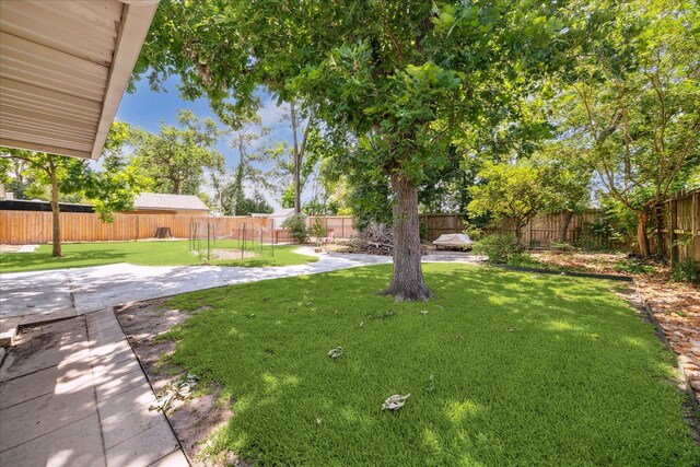4301 Ascot Ln, Houston, TX 77092 - view of yard featuring a patio area