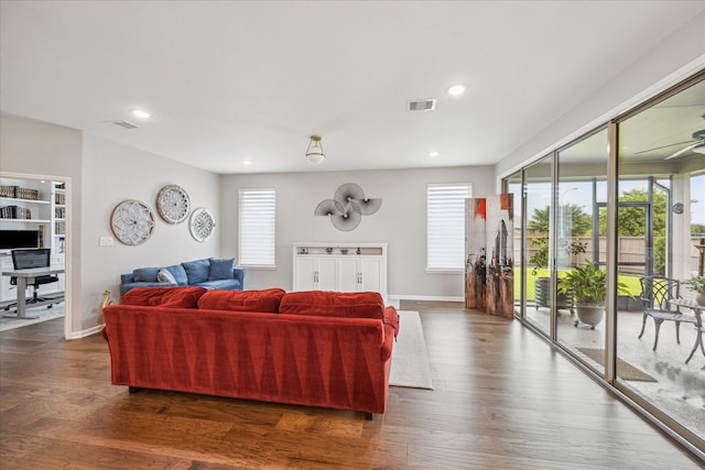 29303 Kellys Falls Ct, Katy, TX 77494 - living area featuring plenty of natural light, baseboards, recessed lighting, and dark wood-type flooring