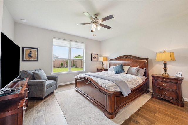 29303 Kellys Falls Ct, Katy, TX 77494 - bedroom featuring wood finished floors, baseboards, and a ceiling fan