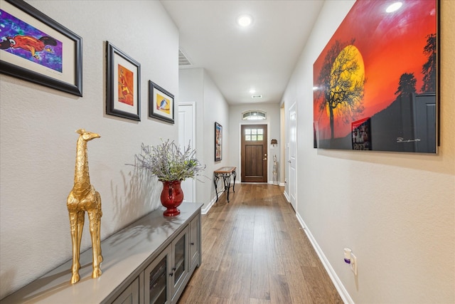 29303 Kellys Falls Ct, Katy, TX 77494 - doorway featuring wood finished floors, recessed lighting, and baseboards