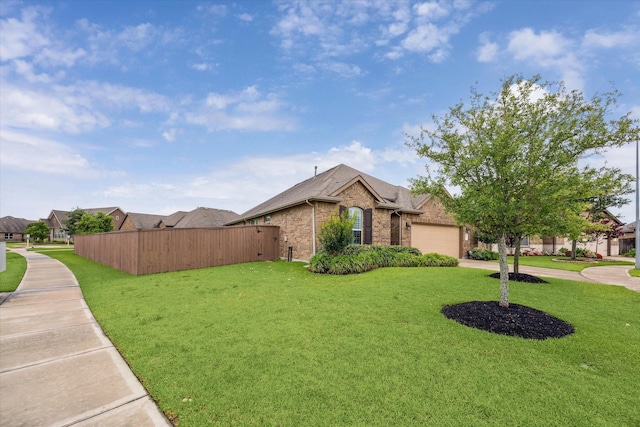 29303 Kellys Falls Ct, Katy, TX 77494 - view of side of property with brick siding, a garage, and concrete driveway