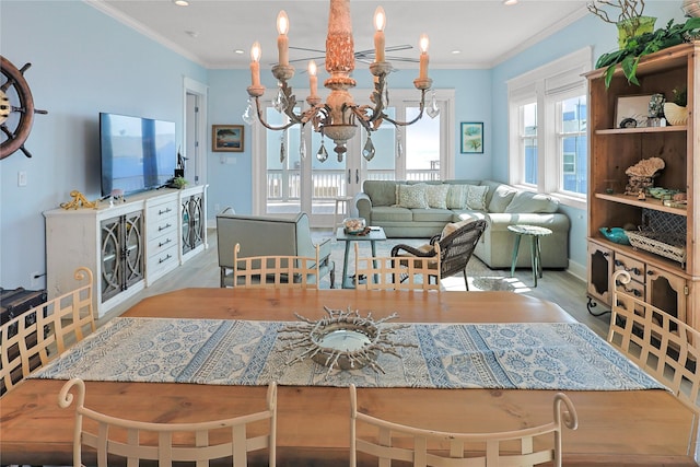 23125 Gulf Dr, Galveston, TX 77554 - dining area with a chandelier, wood finished floors, ornamental molding, and recessed lighting