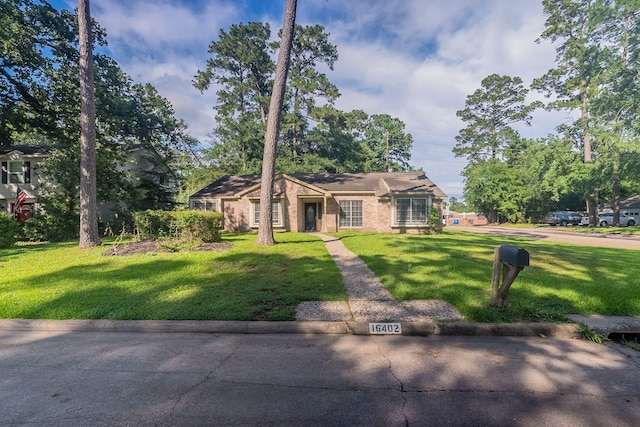 16402 Kleinwood Dr, Spring, TX 77379 - view of front of home featuring a front lawn