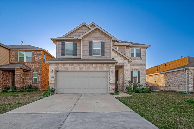 7106 Escondido Dr, Rosharon, TX 77583 - view of front facade with driveway, a garage, a front yard, central air condition unit, and stone siding