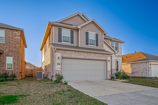 7106 Escondido Dr, Rosharon, TX 77583 - view of front of property with driveway, a garage, and central AC