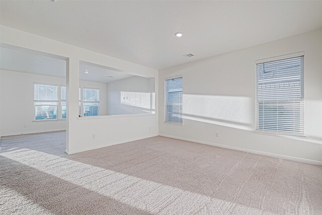 7106 Escondido Dr, Rosharon, TX 77583 - unfurnished room featuring light carpet, baseboards, and recessed lighting