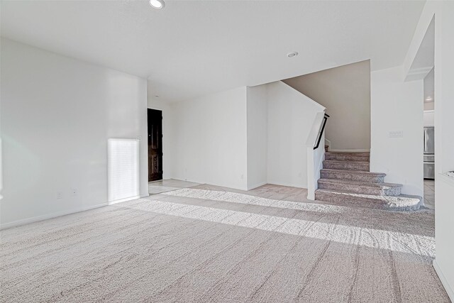 7106 Escondido Dr, Rosharon, TX 77583 - stairway with carpet, baseboards, and recessed lighting