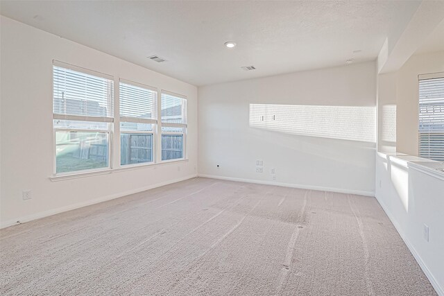 7106 Escondido Dr, Rosharon, TX 77583 - unfurnished room featuring light colored carpet and baseboards