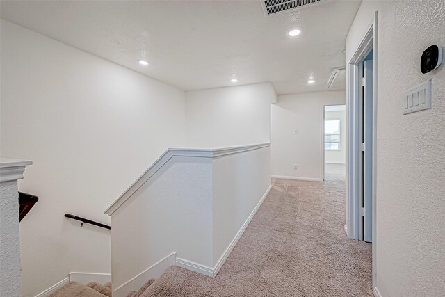 7106 Escondido Dr, Rosharon, TX 77583 - corridor with an upstairs landing, carpet floors, baseboards, and recessed lighting