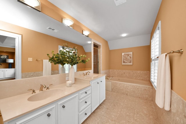 3820 Purdue St, Houston, TX 77005 - full bath with a garden tub, double vanity, and tile patterned floors