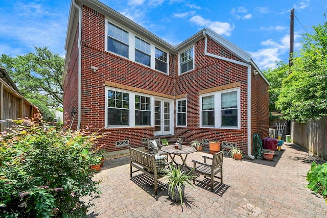 3820 Purdue St, Houston, TX 77005 - back of property featuring brick siding and a patio