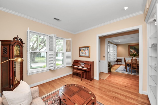 3820 Purdue St, Houston, TX 77005 - sitting room with crown molding, light wood-style flooring, and baseboards