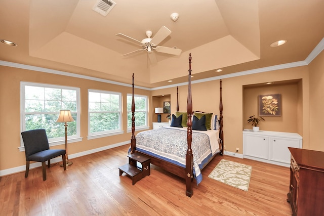 3820 Purdue St, Houston, TX 77005 - bedroom with a tray ceiling, light wood finished floors, crown molding, baseboards, and recessed lighting