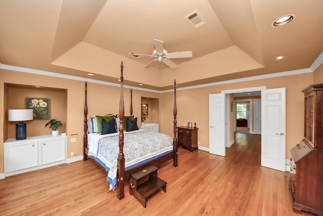 3820 Purdue St, Houston, TX 77005 - bedroom with a raised ceiling, light wood-style floors, ornamental molding, baseboards, and recessed lighting