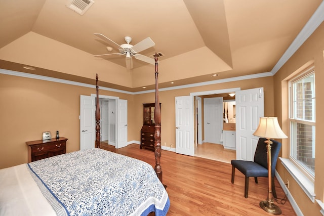 3820 Purdue St, Houston, TX 77005 - bedroom with light wood finished floors, a raised ceiling, baseboards, crown molding, and recessed lighting