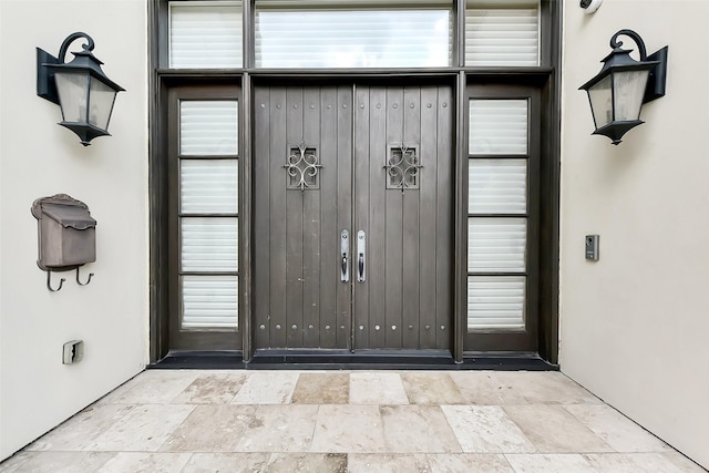 8305 Will Jordan Pkwy, Bellaire, TX 77401 - doorway to property featuring board and batten siding