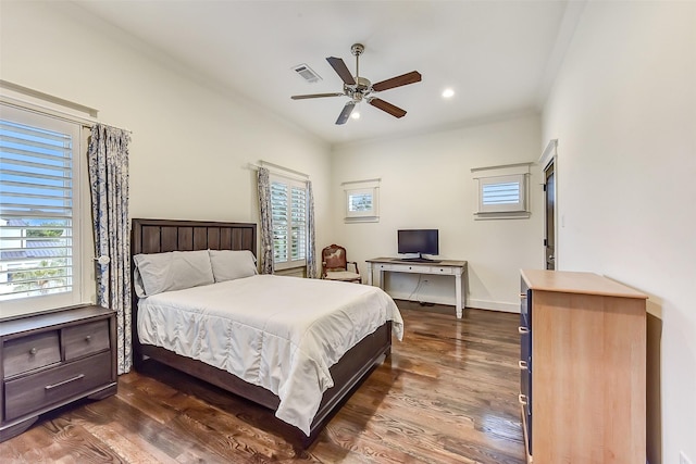 8305 Will Jordan Pkwy, Bellaire, TX 77401 - bedroom with multiple windows, dark wood finished floors, and recessed lighting