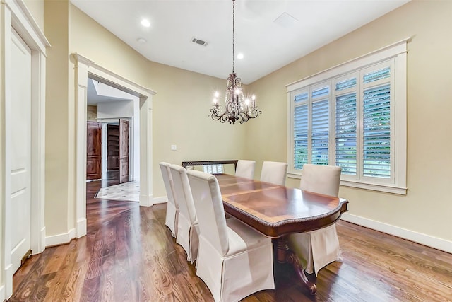 8305 Will Jordan Pkwy, Bellaire, TX 77401 - dining space featuring a chandelier, dark wood-type flooring, baseboards, and recessed lighting