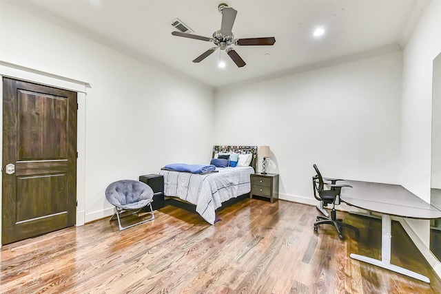 8305 Will Jordan Pkwy, Bellaire, TX 77401 - bedroom featuring wood finished floors, baseboards, recessed lighting, and ceiling fan