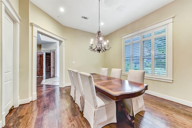 8305 Will Jordan Pkwy, Bellaire, TX 77401 - dining space with a chandelier, dark wood-type flooring, baseboards, and recessed lighting