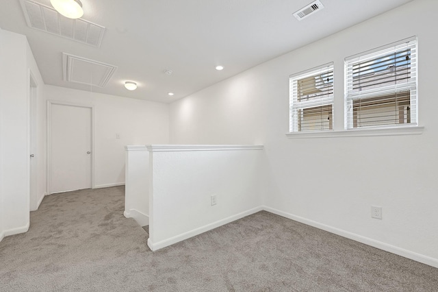 19311 Old Finch Ct, Houston, TX 77073 - unfurnished room featuring attic access, carpet, baseboards, and recessed lighting