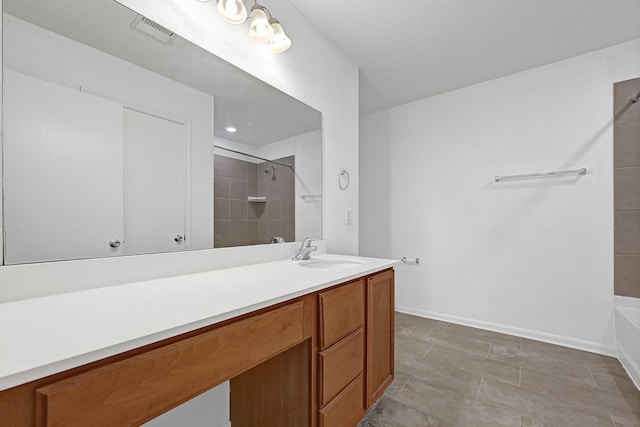 19311 Old Finch Ct, Houston, TX 77073 - bathroom with vanity, baseboards, and shower / bathtub combination