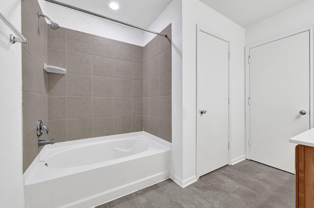 19311 Old Finch Ct, Houston, TX 77073 - bathroom featuring bathtub / shower combination, vanity, tile patterned flooring, and recessed lighting