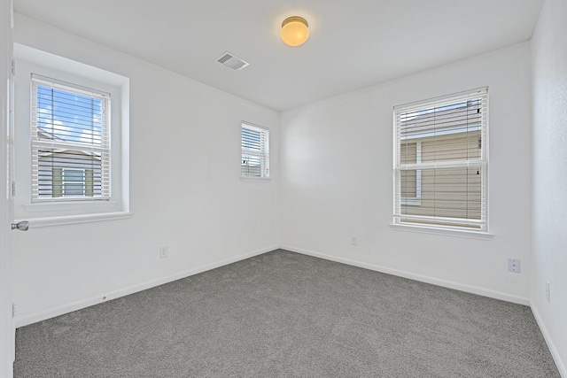 19311 Old Finch Ct, Houston, TX 77073 - spare room featuring dark carpet and baseboards