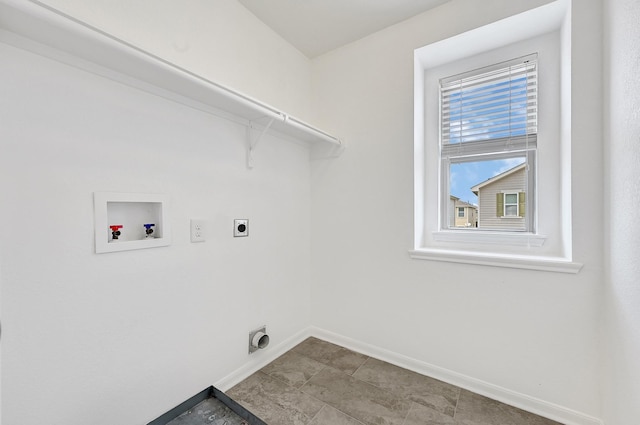 19311 Old Finch Ct, Houston, TX 77073 - washroom with hookup for a washing machine, hookup for an electric dryer, and baseboards