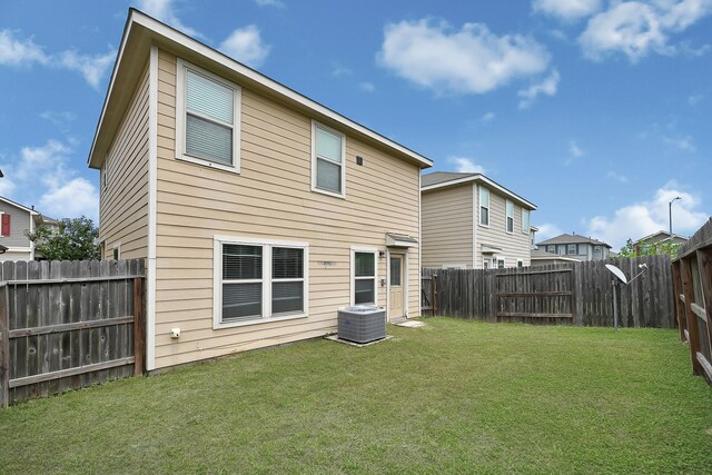 19311 Old Finch Ct, Houston, TX 77073 - back of house featuring central AC unit