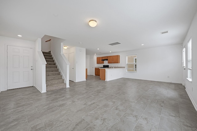 19311 Old Finch Ct, Houston, TX 77073 - unfurnished living room with stairway, recessed lighting, and baseboards