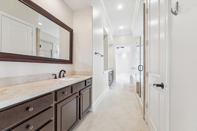 3917 Gramercy St, Houston, TX 77025 - bathroom featuring vanity, baseboards, a shower stall, tile patterned floors, and recessed lighting