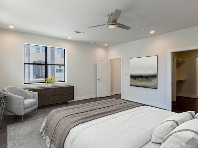 2301 Arabelle St, Houston, TX 77007 - bedroom with recessed lighting, wood finished floors, a ceiling fan, baseboards, and a walk in closet