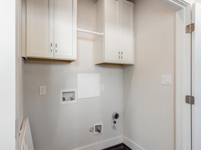 2301 Arabelle St, Houston, TX 77007 - laundry room featuring hookup for a gas dryer, hookup for a washing machine, cabinet space, and baseboards